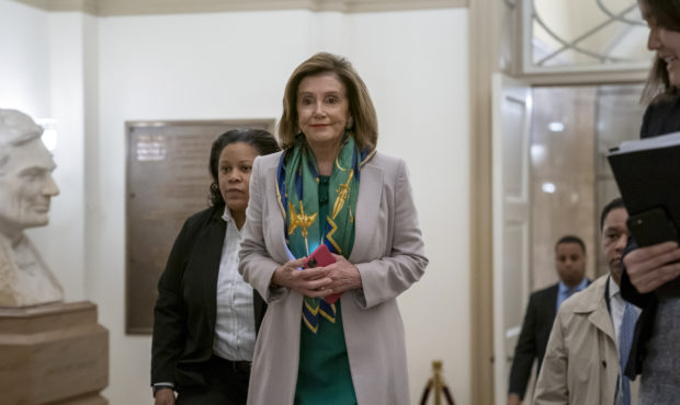 Speaker of the House Nancy Pelosi, D-Calif., arrives to meet with the Democratic Caucus at the Capi...