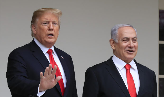 FILE - In this March 25, 2019, file photo, President Donald Trump welcomes visiting Israeli Prime M...