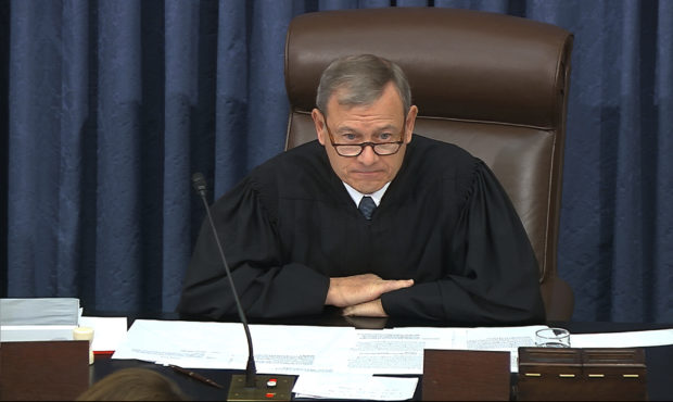 In this image from video, presiding officer Chief Justice of the United States John Roberts speaks ...