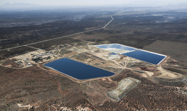 This April 11, 2015, photo provided by EcoFlight shows the White Mesa Uranium Mill near Blanding in...