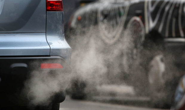 PUTNEY, ENGLAND - JANUARY 10:  Exhaust fumes from a car in Putney High Street on January 10, 2013 i...