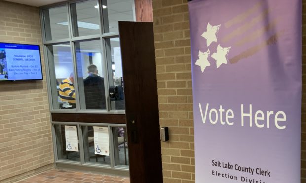 (Signs are posted at the Salt Lake County Clerk's Office, urging people to vote early.  Credit: Pau...