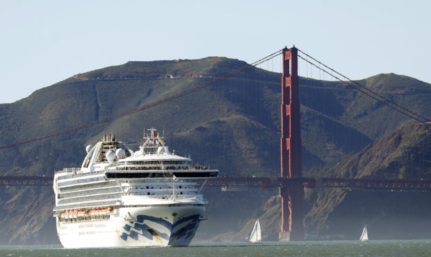 FILE - In this Feb. 11, 2020, file photo, the Grand Princess cruise ship passes the Golden Gate Bri...