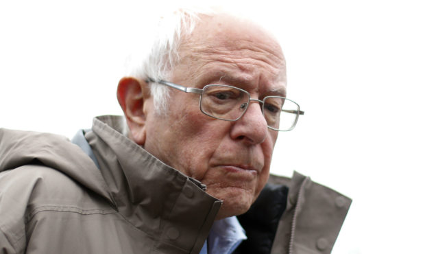 Democratic presidential candidate Sen. Bernie Sanders, I-Vt., visits outside a polling location at ...