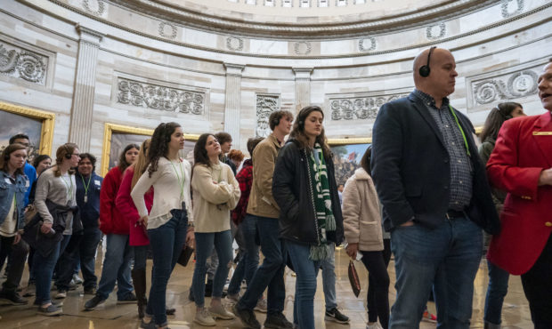 Tourists are arrive for springtime visits as crowds fill the U.S. Capitol, in Washington, Wednesday...