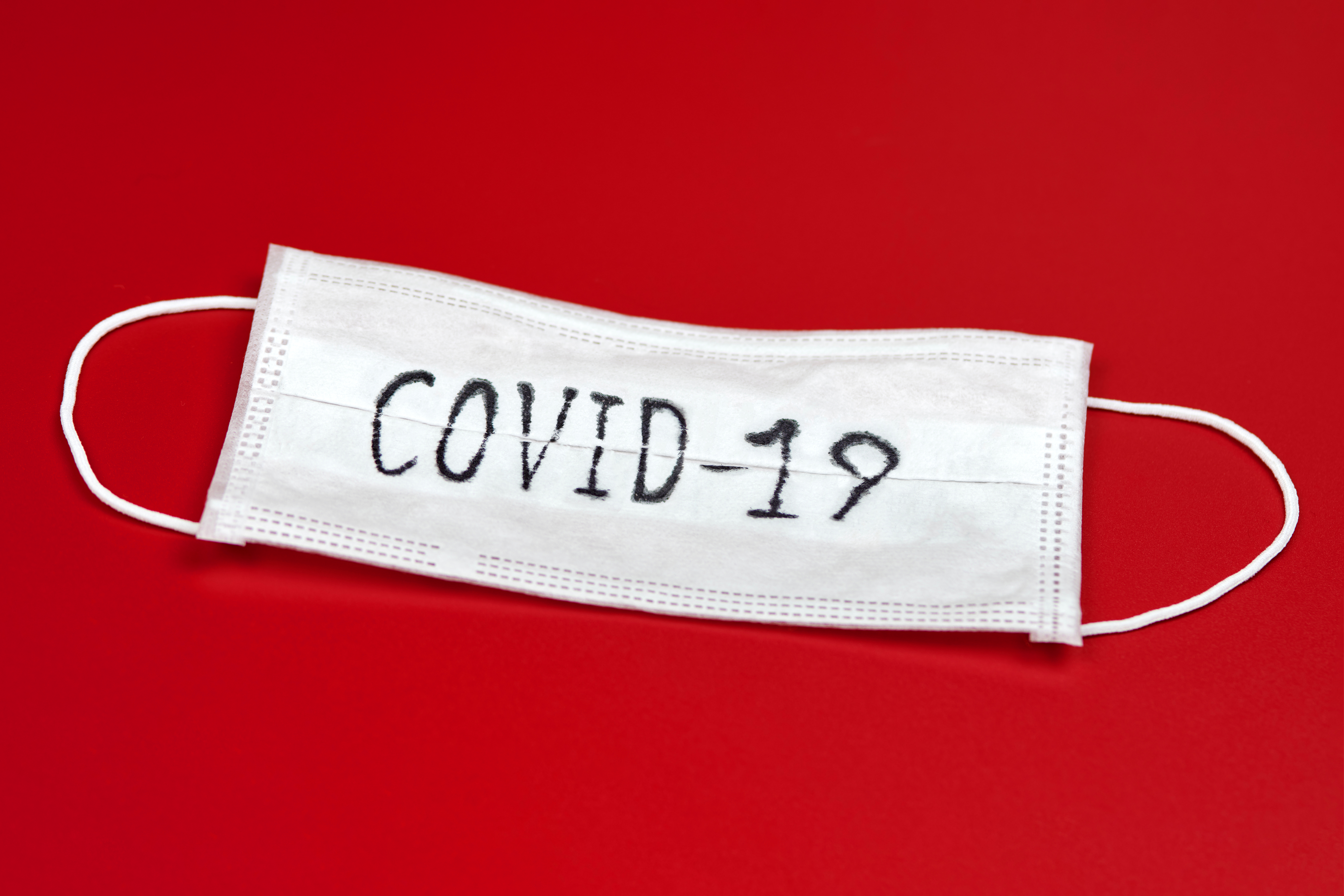COVID-19 - Novel coronavirus - 2019-nCoV, WUHAN virus concept. Surgical mask protective mask with C...