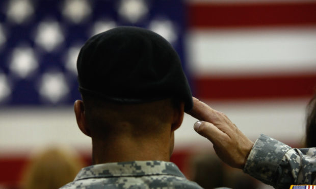FORT CARSON, CO - AUGUST 29:  A U.S. Army soldier salutes during the national anthem as soldiers re...