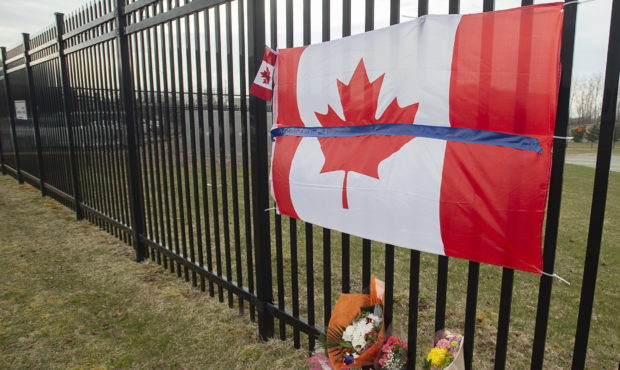 A tribute is displayed Monday, April 20, 2020, at the Royal Canadian Mounted Police headquarters in...