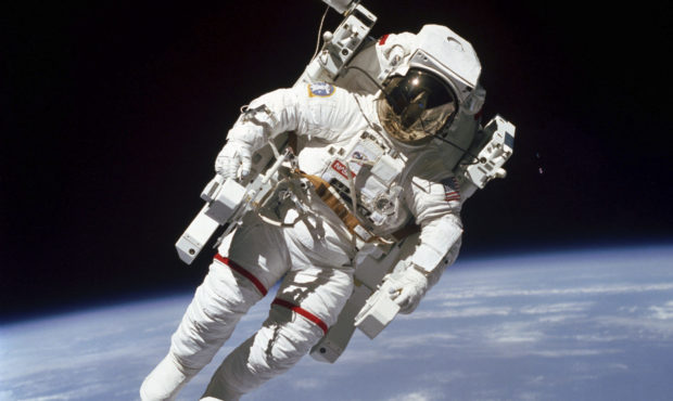 In this Feb. 7, 1984 photo made available by NASA, astronaut Bruce McCandless II, performs a spacew...