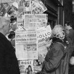 FILE - In this April 14, 1970 file photo, people in Rome look at newspapers headlining the trouble that developed aboard the U.S.'s Apollo 13 mission which led to the cancellation of the attempt to land on the moon. (AP Photo)