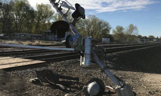 Intoxicated driver runs into railroad crossing signal in Roy, road closed...