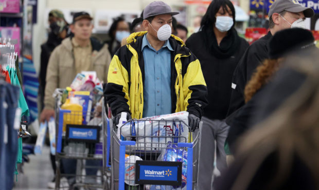 Walmart limits the number of customers in stores to help fight the spread of coronavirus...