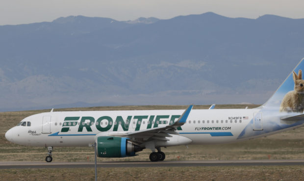 In this April 23, 2020 photo a Frontier Airlines jetliner taxis to a runway for take off from Denve...