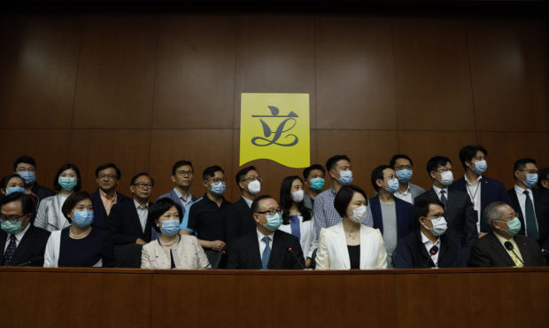 Pro-China lawmakers attend a press conference in respond to a proposal to enact new Hong Kong secur...