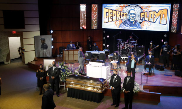 Guests gather at North Central University Thursday, June 4, 2020, before a memorial service for Geo...