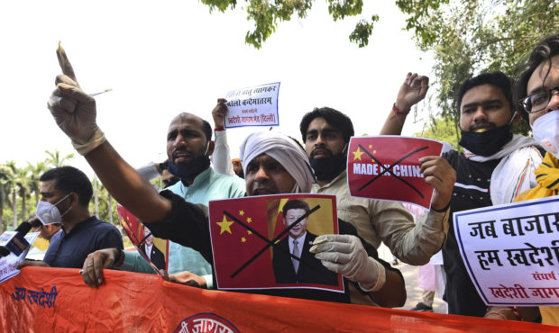 Activists of Swadeshi Jagran Manch shout slogans during a protest near the Chinese embassy in New D...