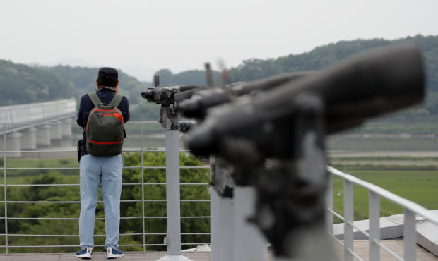 A visitor watches the northern side from the Imjingak Pavilion in Paju, South Korea, Thursday, June...