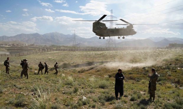 In this photo taken on June 6, 2019, a US military Chinook helicopter lands on a field outside the ...