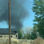 Drivers reported a thick black plume of smoke shortly after reports of a plane crash in West Jordan on Saturday, July 25, 2020. Photo: Brittany Henry
