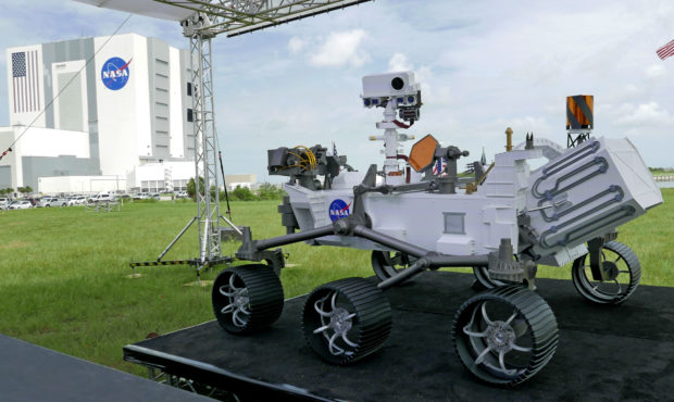 A replica of the Mars rover Perseverance is displayed outside the press site before a news conferen...
