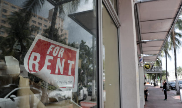 FILE - In this July 13, 2020 file photo, a For Rent sign hangs on a closed shop during the coronavi...