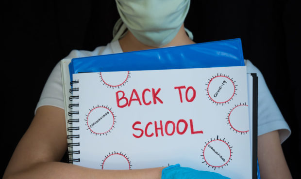 Doctors have mixed feelings about kids going back to school because of spiking COVID-19 cases refug...