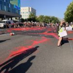 Protesters spread red paint on 500 South, outside the office of Salt Lake County District Attorney Sim Gill on July 9, 2020. Photo: Paul Nelson, KSL NewsRadio 