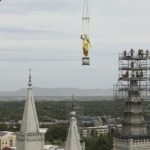 Crews watch after the Angel Moroni statue is removed from atop the Salt Lake Temple of The Church of Jesus Christ of Latter-day Saints during renovation in Salt Lake City on Monday, May 18, 2020. Jeffrey D. Allred, Deseret News