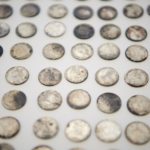 These coins were deposited in the capstone of the Salt Lake Temple on April 6, 1892. Some 400 coins—mostly nickels and dimes, some pennies, a few quarters—have been found inside the concrete. | Intellectual Reserve