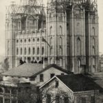 On April 6, 1892, a crowd of 30,000 people gathered around the Salt Lake Temple, with another 10,000 looking on from nearby streets, building roofs and trees, to witness the laying of the capstone. | Intellectual Reserve