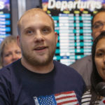 FILE: Josh Holt, left, makes a statement to the media with his wife, Thamy, right, upon their arrival in Salt Lake City after receiving medical care and visiting President Donald Trump in Washington on Monday, May 28, 2018. (AP Photo/Kim Raff)