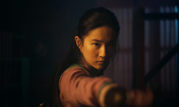 This image released by Disney shows Yifei Liu in the title role of "Mulan."  The film is no longer ...