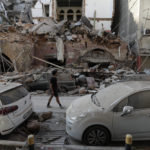 Destruction is seen after a massive explosion in Beirut, Lebanon, Wednesday, Aug. 5, 2020. The explosion flattened much of a port and damaged buildings across Beirut, sending a giant mushroom cloud into the sky. In addition to those who died, more than 3,000 other people were injured, with bodies buried in the rubble, officials said.(AP Photo/Hassan Ammar)