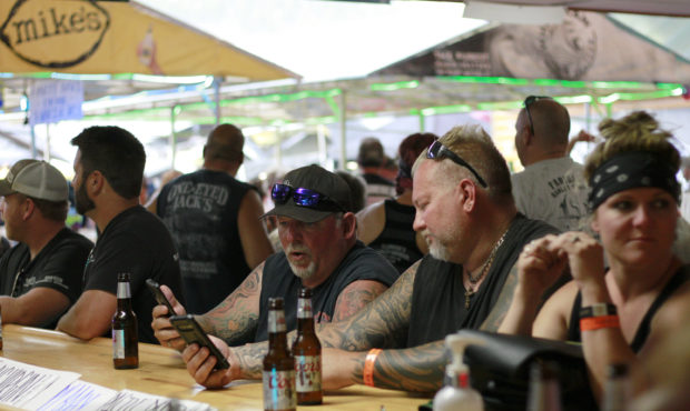 People congregates at One-Eyed Jack's Saloon during the 80th annual Sturgis Motorcycle Rally on Aug...