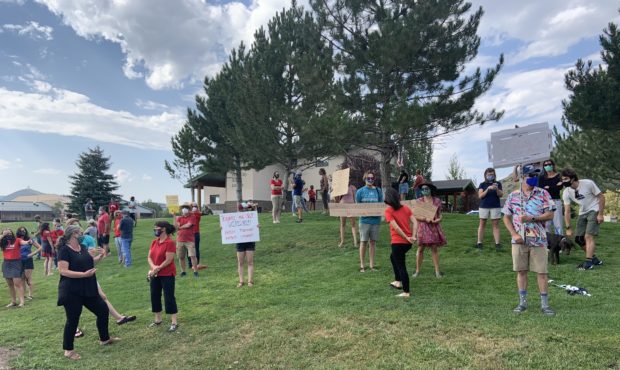 (Parents protesting outside the  Park City School District offices.  Credit: Paul Nelson)...