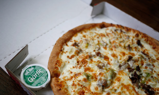A large Philly cheesesteak pizza from a Papa John's International Inc. restaurant is arranged for a...