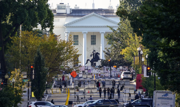 The White House is seen in Washington, early Tuesday, Oct. 6, 2020, the morning after President Don...