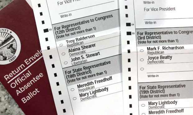 This photo made on Oct. 6, 2020, in Westerville, Ohio, shows Ohio absentee ballots. Two voters regi...