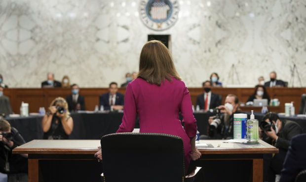 Supreme Court nominee Amy Coney Barrett arrives for her Senate Judiciary Committee confirmation hea...