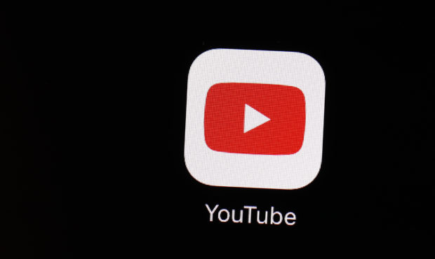 FILE - This March 20, 2018 file photo shows the YouTube app on an iPad in Baltimore. YouTube is fol...