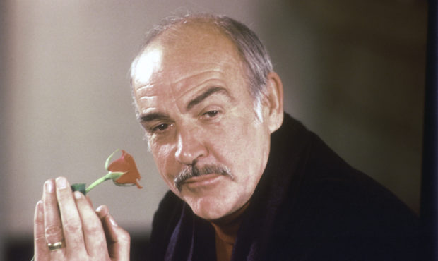 FILE - In this Jan. 23, 1987 file photo, actor Sean Connery holds a rose in his hand as he talks ab...