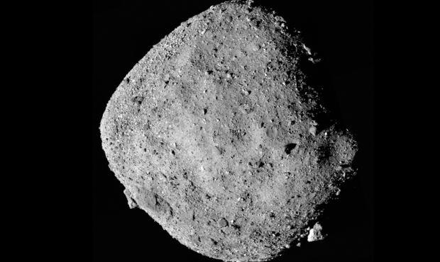 This mosaic image of asteroid Bennu is composed of 12 PolyCam images collected on Dec. 2 by the OSI...