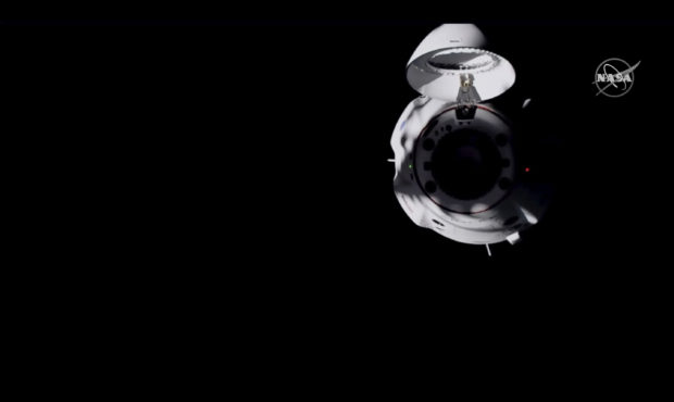 In this frame grab from NASA TV, the SpaceX Dragon capsule approaches the International Space Stati...