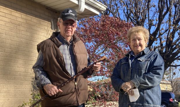 Dan Donovan, joined by his wife, Barbara, holds the antique shillelagh he used to chase burglars fr...