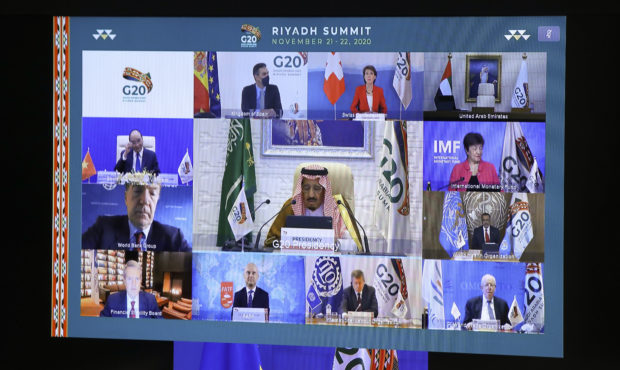 European Council President Charles Michel, on screen bottom, participates in a virtual G20 meeting,...