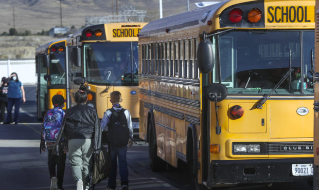 Students walk to their buses following school at Rose Springs Elementary in Erda, Tooele County, on...