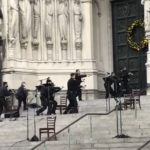 Gunman shot by police at NYC cathedral Christmas concert