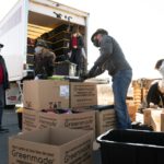 Volunteers help pack and load boxes in a truck in Salt Lake City, Utah, on Tuesday, December 8, 2020. The donated items include new backpacks, crayons, binders, notebooks, toilet paper, canned food and soap.

(The Church of Jesus Christ of Latter-day Saints)
