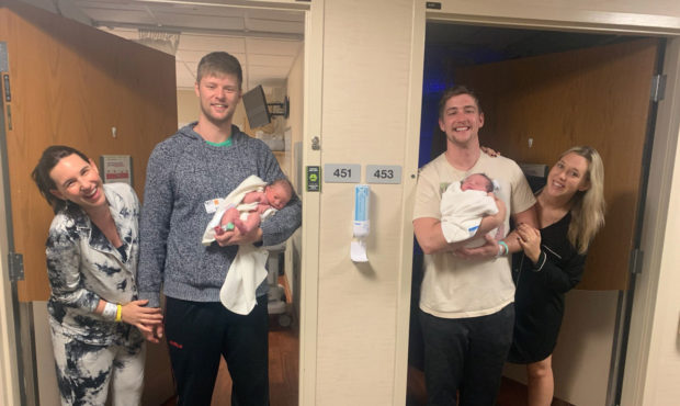 Ashley and John Carruth and Joe and Brittany Schille (left to right) hold their newborn sons Cassiu...