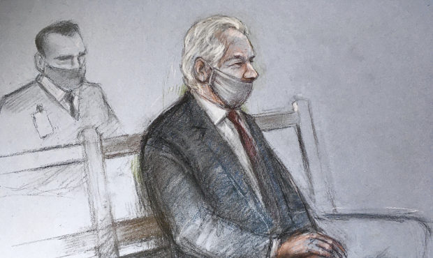 This is a court artist sketch by Elizabeth Cook of Julian Assange appearing at the Old Bailey in Lo...